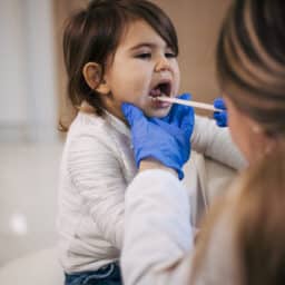 Child gets tonsils checked