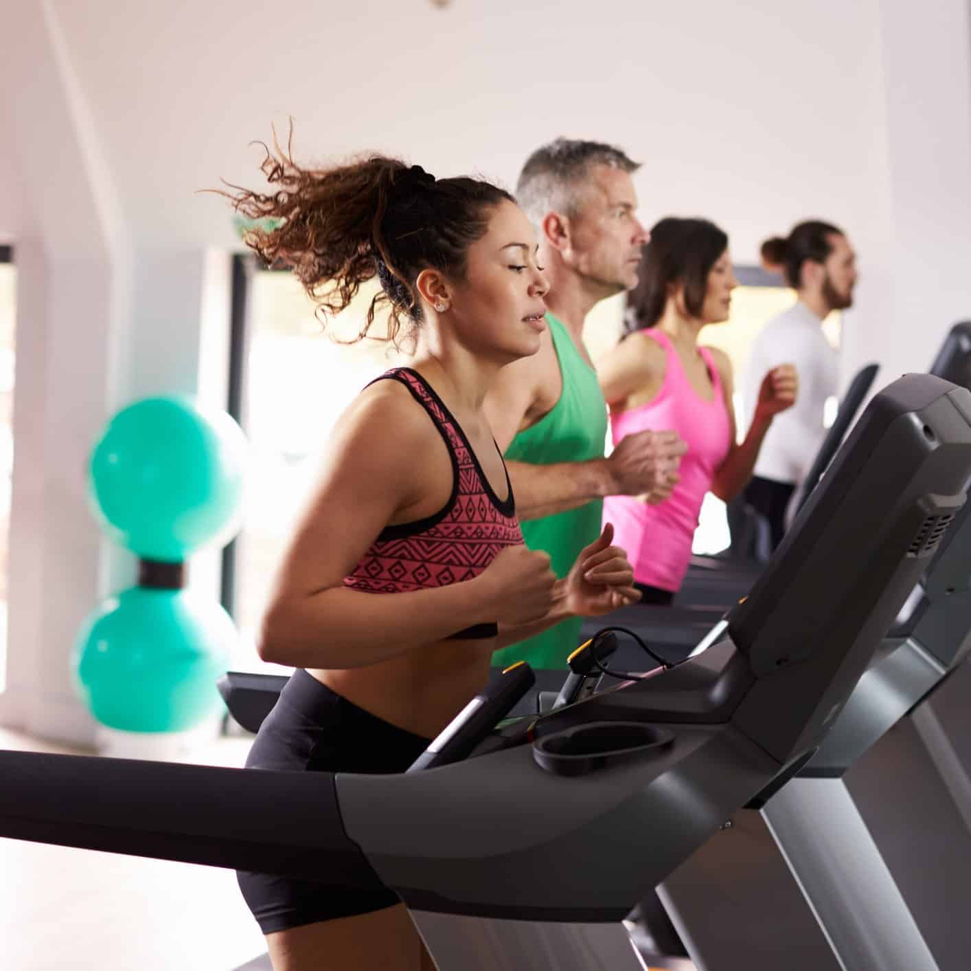 Woman with allergies running on a treadmill